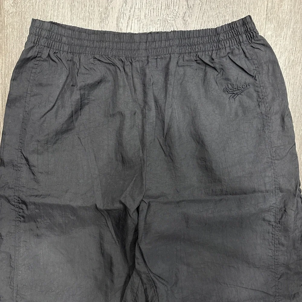 VTG Reebok Mens Track Pants Black Size Medium Elastic Waist Drawstring Nylon Zip
